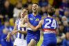 MELBOURNE, AUSTRALIA - JUNE 24: Matthew Suckling and Shane Biggs of the Bulldogs (right) celebrate during the 2017 AFL ...