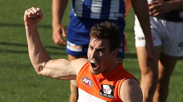 Giant run: Jeremy Cameron celebrates a goal against the Kangaroos at Blundstone Arena.