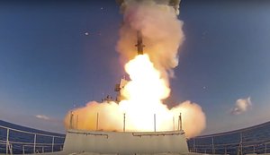 In this image provided by Russian Defense Ministry Press Service and released on Friday, June 23, 2017, long-range Kalibr cruise missiles are launched by a Russian Navy ship in the eastern Mediterranean.