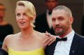 George Miller, Charlize Theron and Tom Hardy at Fury Road's premiere at the 68th Cannes Film Festival in 2015. 