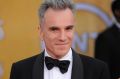 FILE- In this Jan. 27, 2013, file photo, Daniel Day-Lewis arrives at the 19th Annual Screen Actors Guild Awards at the ...