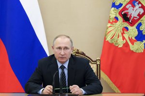 Russian President Vladimir Putin chairs a Security Council meeting in Moscow, Russia, Friday, May 5, 2017.