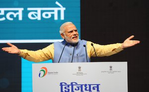 The Prime Minister, Shri Narendra Modi addressing the gathering at the DigiDhan Mela, in New Delhi, Indian