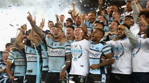 The Cronulla Sharks celebrate their victory over Melbourne Storm.