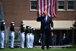 President Donald Trump heads to the stage for the 136th Coast Guard Academy commencement exercise in New London, Conn., May 17, 2017.