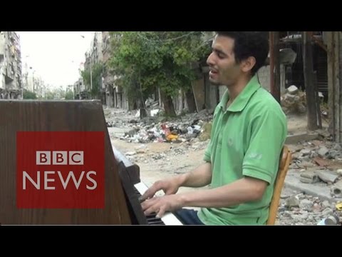 Pianist of Yarmouk films his journey from Syria to Europe - BBC News