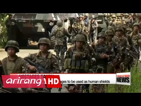 Philippine troops battle Islamists in besieged city of Marawi