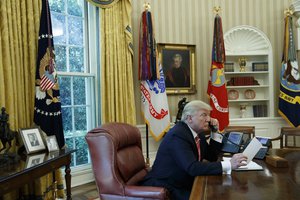 President Donald Trump talks with new Irish Prime Minister Leo Varadkar during a telephone call, Tuesday, June 27, 2017, in the Oval Office of the White House in Washington.