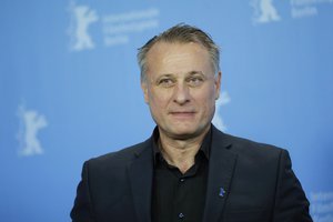 Actor Michael Nyqvist poses for photographers during a photo call for the film 'A Serious Game' at the 2016 Berlinale Film Festival in Berlin, Germany, Tuesday, Feb. 16, 2016.