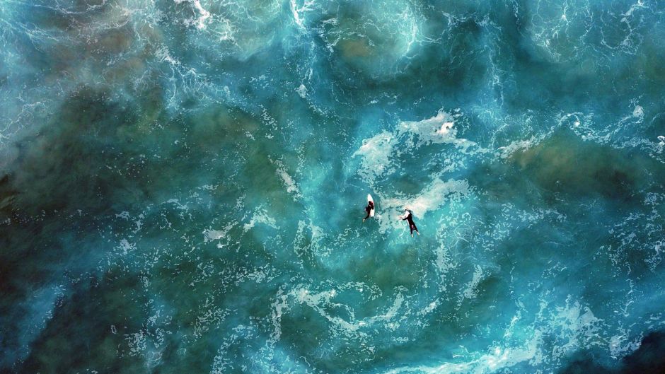 SYDNEY, NEW SOUTH WALES - JUNE 16: An aerial view of surfers at Mackenzies Beach on June 16, 2017 in Sydney, Australia. ...