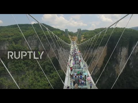 China: World's longest glass-bottom bridge opens in Hunan province