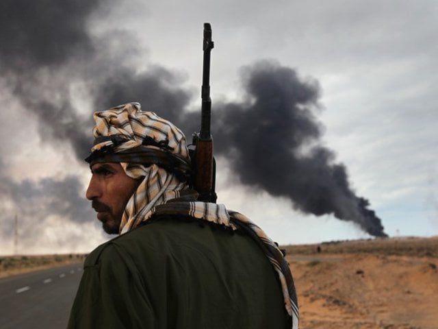 Photographer John Moore on 'Epic' Libya Battles, Arab World Revolutions