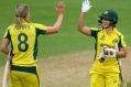 TAUNTON, ENGLAND - JUNE 26: Australia batsman Nicole Bolton (r) and Ellyse Perry celebrate victory during the ICC ...