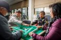 ACT Chinese Australian Association members Baoan Yuan, Shu Guichen, Cai Jiefeng, and Younei Peng play mahjong at the ...