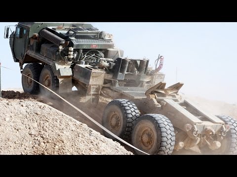 The Ultra Heavy LVS Truck in Action - Logistics Vehicle and Towing System Moving Tons of Material