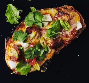 Cheese on toast with chorizo.