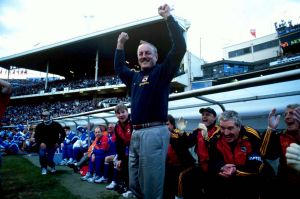 Adelaide Crow's coach Malcolm Blight jumps as the final siren blows for their second premiership win, the 1998 AFL Grand ...