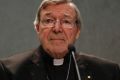 Cardinal George Pell meets the media, at the Vatican, on Thursday.