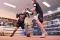 Jeff Horn (left) trains with Glenn Ruston during a training session in Brisbane, on Monday.