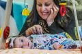 Jerrabomberra's Melissa Agius with daughter Loralei, nine weeks. She said Red Nose helped her cope with her fears of ...