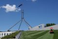 Instead of a berm or moat, a new fence will cut across the lawns at Parliament House.