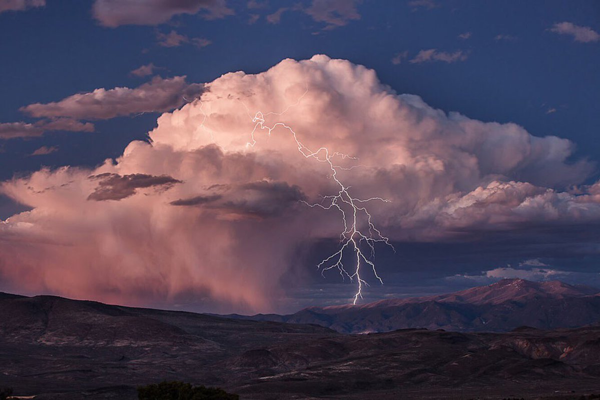 Lightning strikes a rugged mountain top