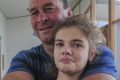 Canberra Raiders coach Ricky Stuart, pictured with his 18-year-old autistic daughter Emma at his respite house, wants ...