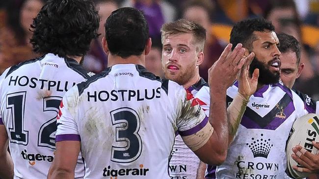 Melbourne Storm players celebrate a Josh Addo-Carr try during the Round 17 NRL match between the Brisbane Broncos and the Melbourne Storm at Suncorp Stadium in Brisbane, Friday, June 30, 2017. (AAP Image/Albert Perez) NO ARCHIVING, EDITORIAL USE ONLY