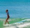 Take a surfing lesson at the main beach. 