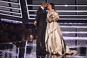 Drake kisses Rihanna as she accepts the Michael Jackson Video Vanguard Award at the MTV Video Music Awards at Madison Square Garden