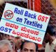 Textile traders protest against the new goods and services tax in Bangalore, India on Friday/ The new system will ...