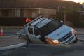 A ute has fallen into what looks like a sinkhole in Wanneroo.