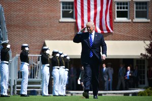 File - President Donald J. Trump salutes 195 cadets during the 136th U.S. Coast Guard Academy commencement in New London, Conn., May 17, 2017.