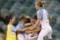 Melbourne City celebrate their semi-final win against Canberra United.