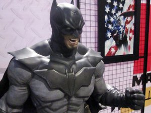 A growling Batman action figure on display at a Toy Convention. Taken on April 2017.