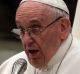 Pope Francis talks to students during a meeting to promote peace at the Vatican on Saturday.