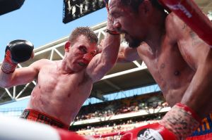  Jeff Horn  punches Manny Pacquiao during their fight  at Suncorp Stadium.  