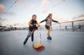 Harry Spencer-Gibson and his sister Kitty skate at Bondi Winter Wonderland outdoor ice rink