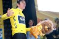 Lion's share: Welshman Geraint Thomas of Team Sky earns the yellow jersey and a promotional lion – a reminder of rugby ...