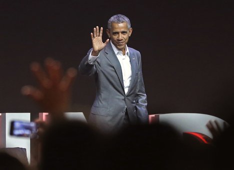 Former U.S. President Barack Obama waves at the audience after delivering his speech during the 4th Congress of the Indonesian Diasporas in Jakarta, Indonesia, Saturday, July 1, 2017.