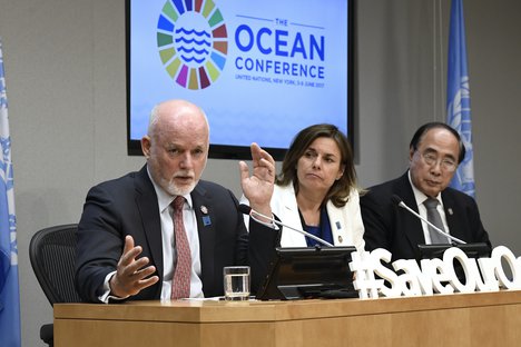 File - Peter Thomson (left), President of the seventy-first session of the General Assembly, briefs journalists on the Ocean Conference which took place at UN headquarters from 5 to 9 June.