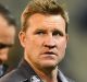 MELBOURNE, AUSTRALIA - MAY 20: Magpies head coach Nathan Buckley walks off after speaking to his players during the ...