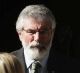 President of Sinn Fein Gerry Adams leaves 10 Downing Street following a meeting with Britain's Prime Minister Theresa ...