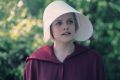 In The Handmaid's Tale, Offred (Elisabeth Moss) is assigned a new name derived from that of her owner: "of Fred".