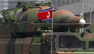 In this photo taken Sunday, April 15, 2012, what appears to be a new missile is carried during a mass military parade at the Kim Il Sung Square in Pyongyang, North Korea, to celebrate the 100th anniversary of the country's founding father Kim Il Sung.