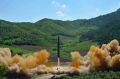This photo distributed by the North Korean government shows what was said to be the launch of a Hwasong-14 ...