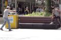 Lee Matthew Hillier (right) pictured during the Queen Street Mall siege on March 8, 2013.