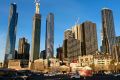 High-rise buildings along Elizabeth Street and Franklin Street dominate the view from Melbourne's Queen Victoria Market. 