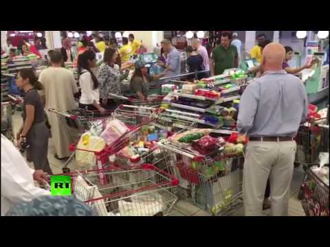 RAW: Qataris rush to stock up on food ahead of price hike