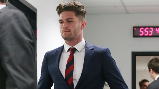 Melbourne Demons Tomas Bugg leaves the AFL tribunal in Melbourne. 